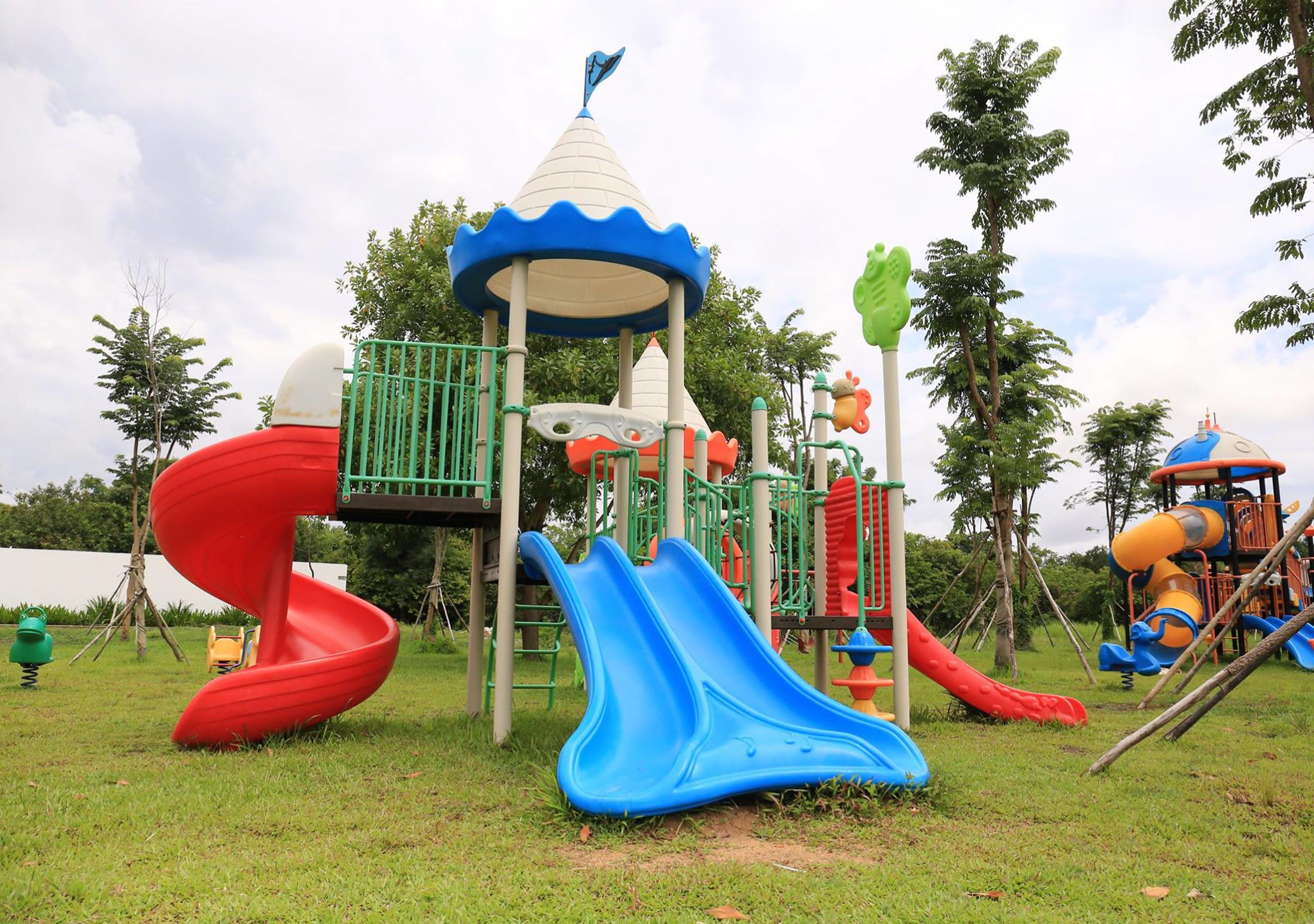 A playground with slides and climbing structures.
