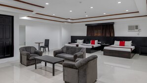 Deluxe Family Room | Desk, soundproofing, iron/ironing board (on request), rollaway beds - RedDoorz Check Inn Bacolod (Bacolod)