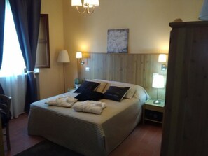 Ropa de cama de alta calidad y minibar