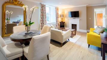 Suite, 1 Bedroom, Garden View | Living area | 40-inch flat-screen TV with digital channels, TV