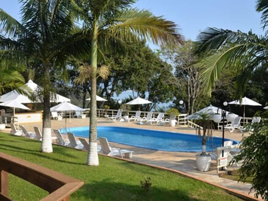 Indoor pool, 2 outdoor pools, open 9:00 AM to 10:00 PM, pool umbrellas