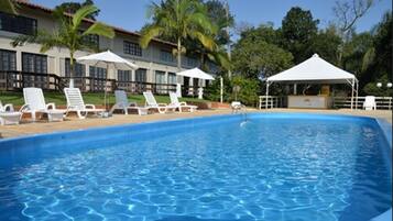 Indoor pool, 2 outdoor pools, open 9:00 AM to 10:00 PM, pool umbrellas
