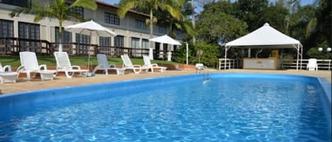 Indoor pool, pool umbrellas, pool loungers