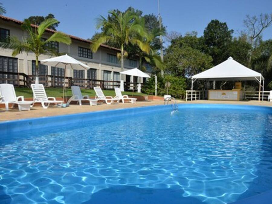 Indoor pool, 2 outdoor pools, open 9:00 AM to 10:00 PM, pool umbrellas