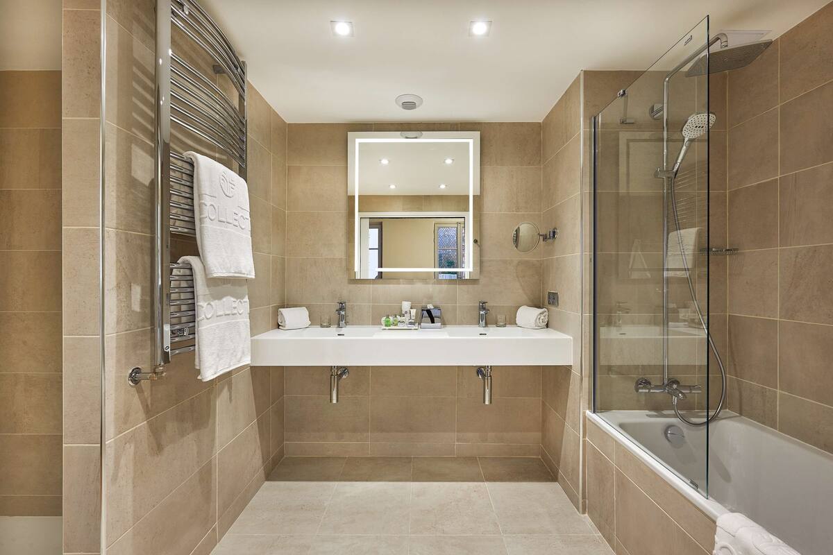 eco-friendly toiletries, hair dryer, towels