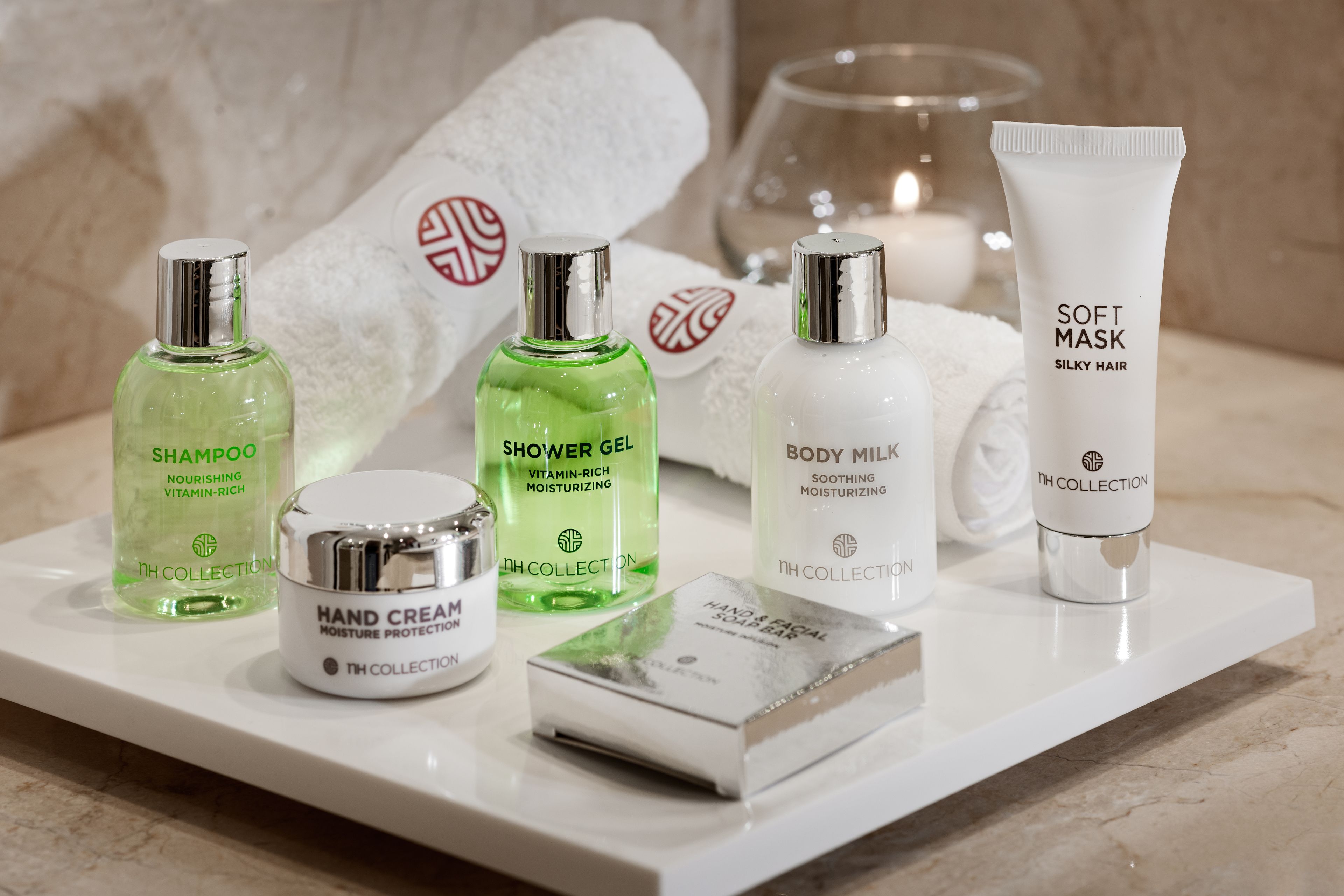 eco-friendly toiletries, hair dryer, towels