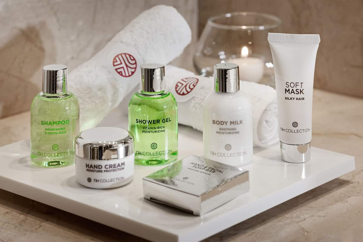 Eco-friendly toiletries, hair dryer, towels