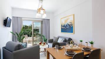 Superior Apartment, 1 Bedroom, Mountain View | Living room | 35-inch flat-screen TV with cable channels, TV