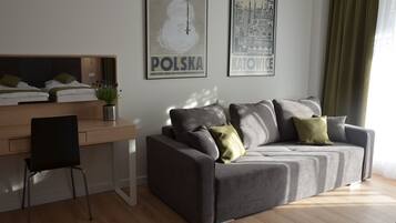 Deluxe Studio (Warszawa) | Ruang tamu | TV skrin rata