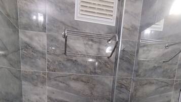 Shower, free toiletries, hair dryer, towels