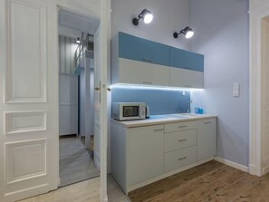 Appartement, 2 chambres | Coin cuisine privé | Réfrigérateur, plaque de cuisson, bouilloire électrique