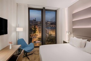 Standard Room, Garden View | Down comforters, minibar, in-room safe, desk