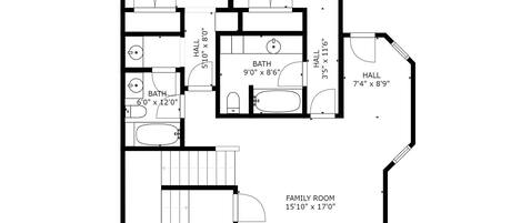 Ein Grundriss einer Wohnung mit zwei Schlafzimmern, einem Wohnzimmer, zwei Bädern, einer Diele und einem Waschraum.