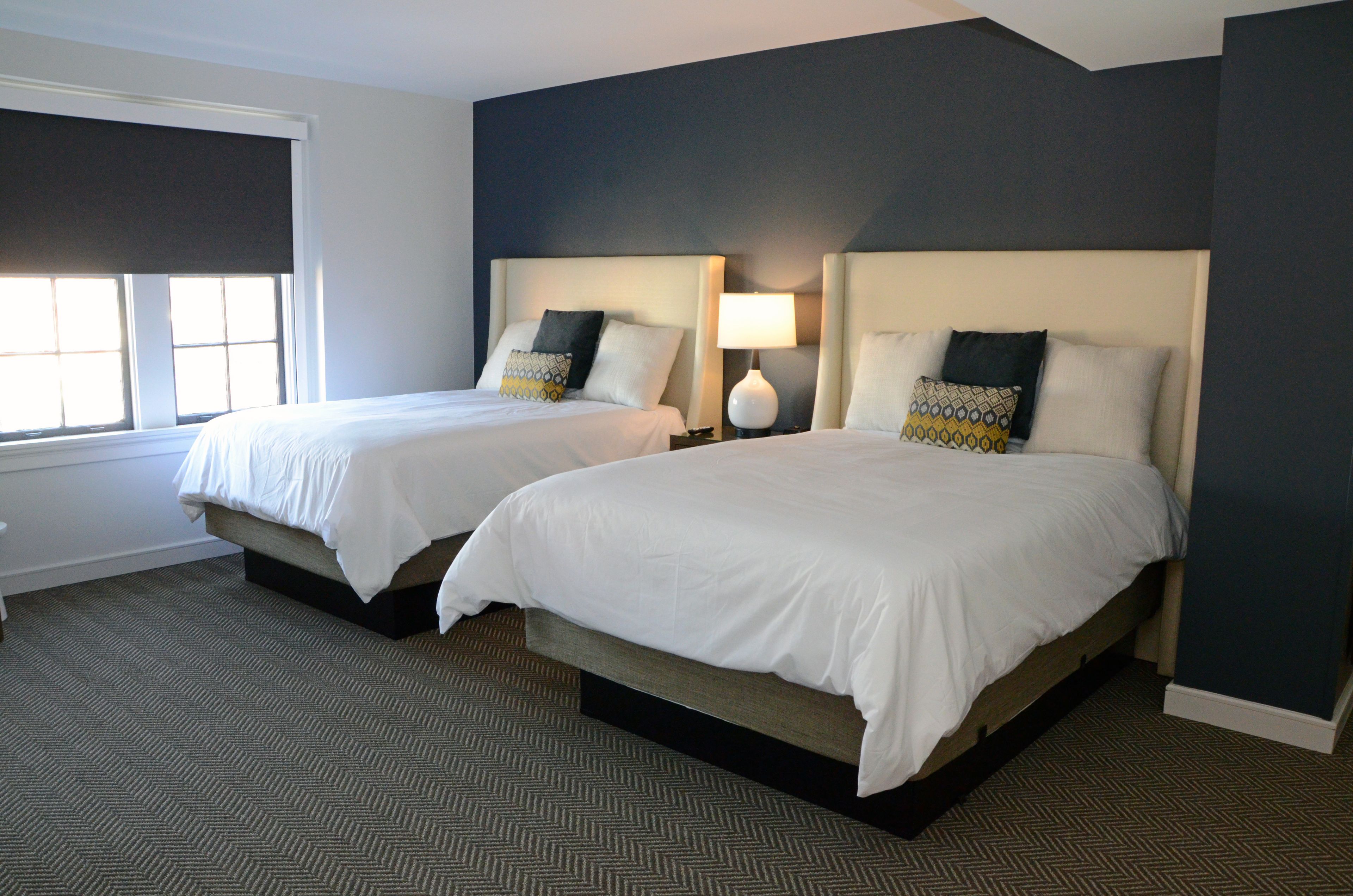 deluxe suite | premium bedding, desk, laptop workspace, iron/ironing board