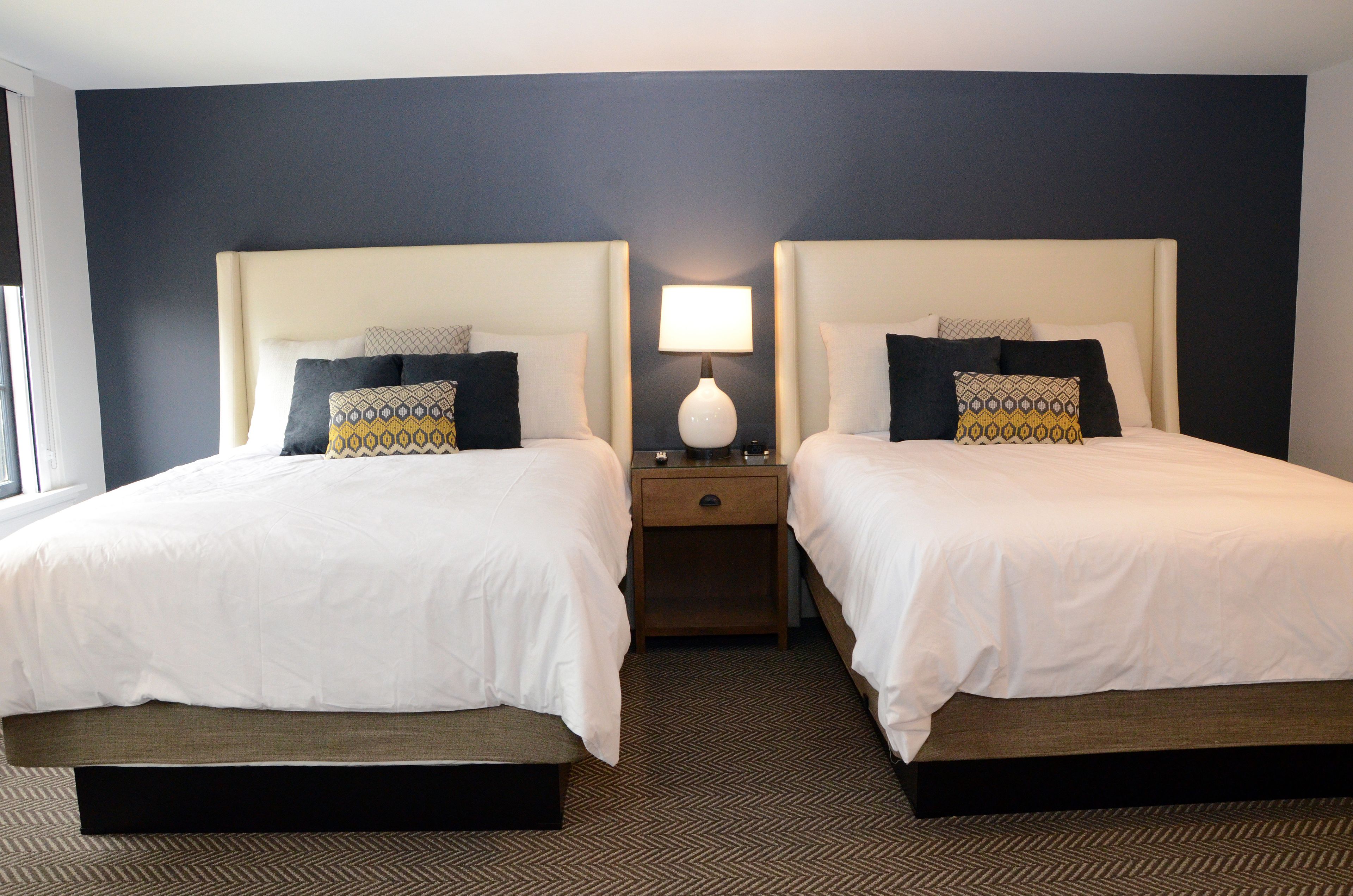 deluxe suite | premium bedding, desk, laptop workspace, iron/ironing board