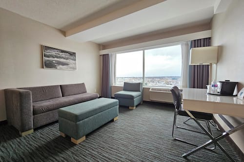 Deluxe Room, 2 Queen Beds (Deluxe Family Suite) | Living area