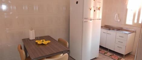 Standard Apartment, 3 Bedrooms | Private kitchen | Full-sized fridge, microwave, stovetop, cookware/dishes/utensils