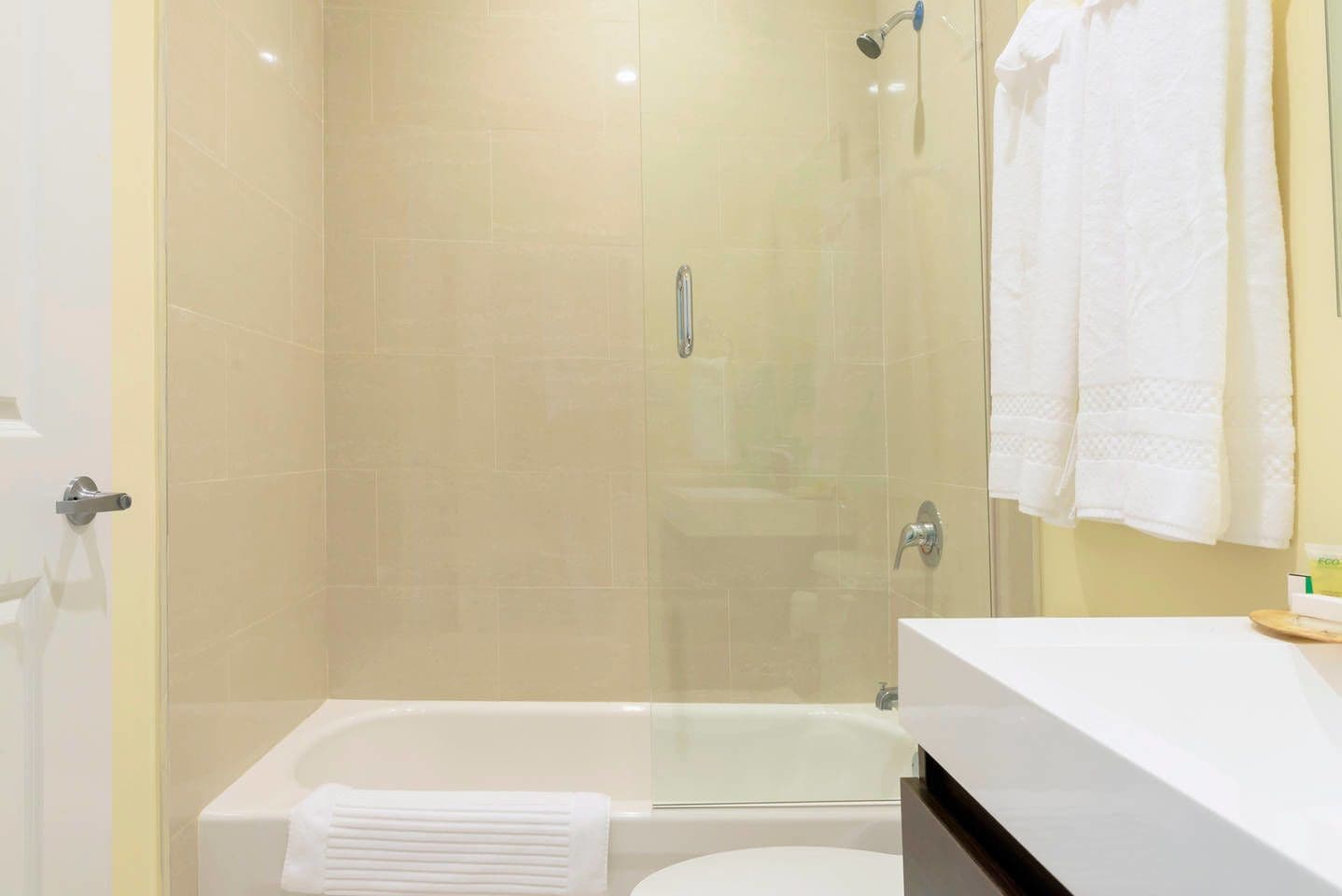 Grand Condo, 2 Bedrooms | Bathroom | Combined shower/bathtub, free toiletries, hair dryer, towels