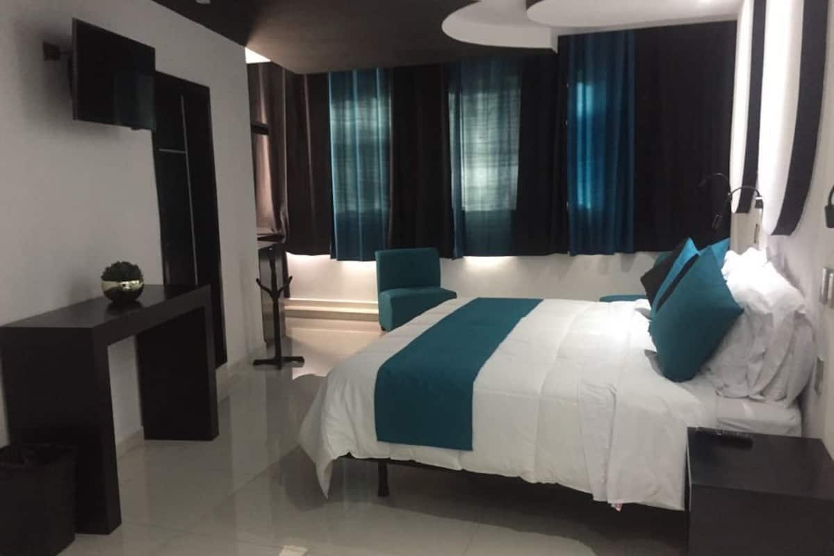 Deluxe Room, City View | Iron/ironing board, free WiFi, bed sheets