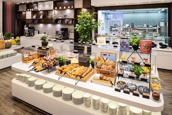 Daily buffet breakfast (EUR 26 per person)