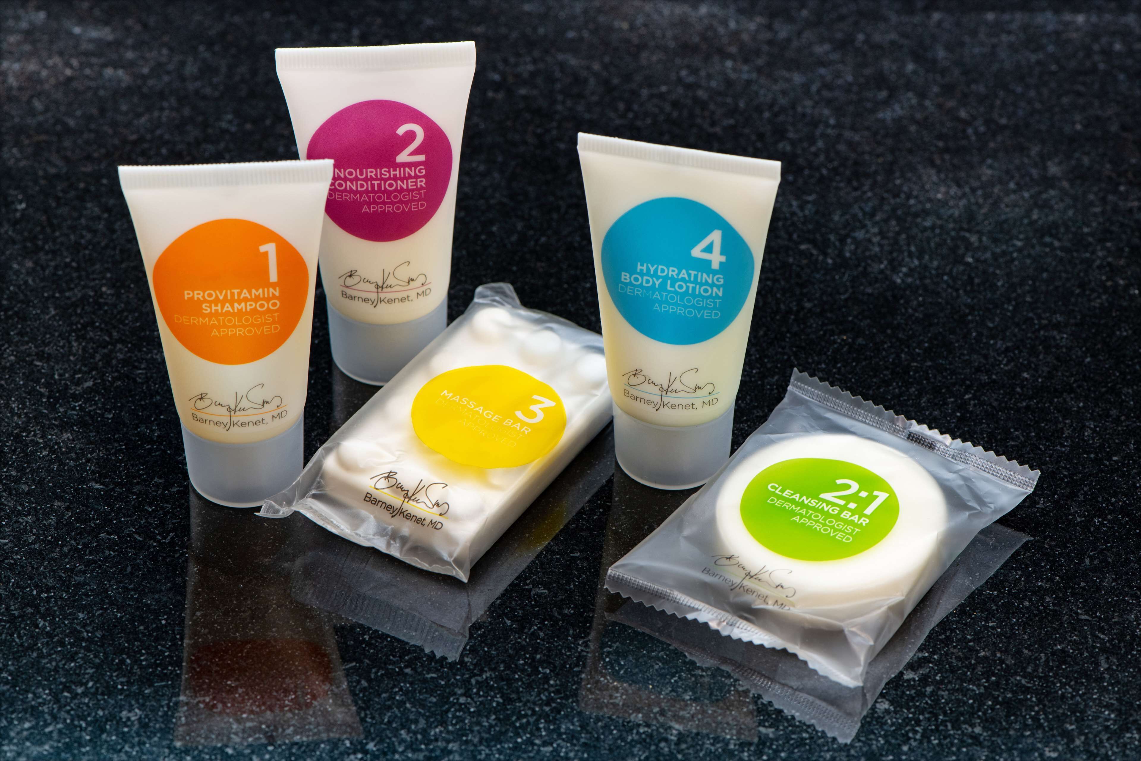 designer toiletries, hair dryer, towels