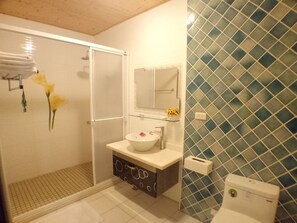 Shower, free toiletries, hair dryer, slippers