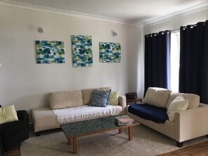 Cottage, 4 Bedrooms | Living area | LCD TV, fireplace, DVD player