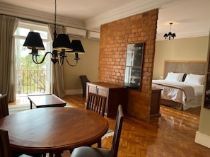 Superior Studio Suite, 1 Bedroom, Garden View | Minibar, in-room safe, laptop workspace, blackout curtains - Hotel Escola Bela Vista (Volta Redonda)