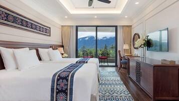 Habitación clásica | Ropa de cama de alta calidad y minibar