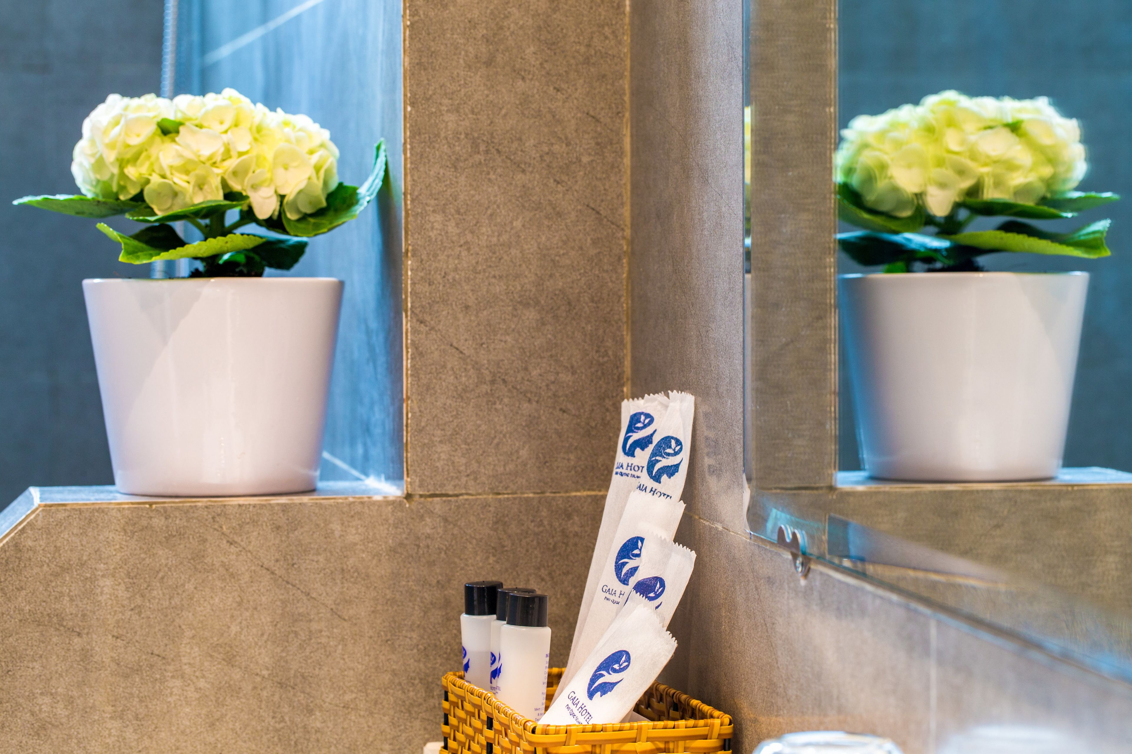 executive triple room | bathroom | free toiletries, hair dryer, slippers, towels