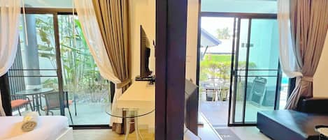 Honeymoon Suite with Garden View | Living area | 42-inch flat-screen TV with cable channels, TV