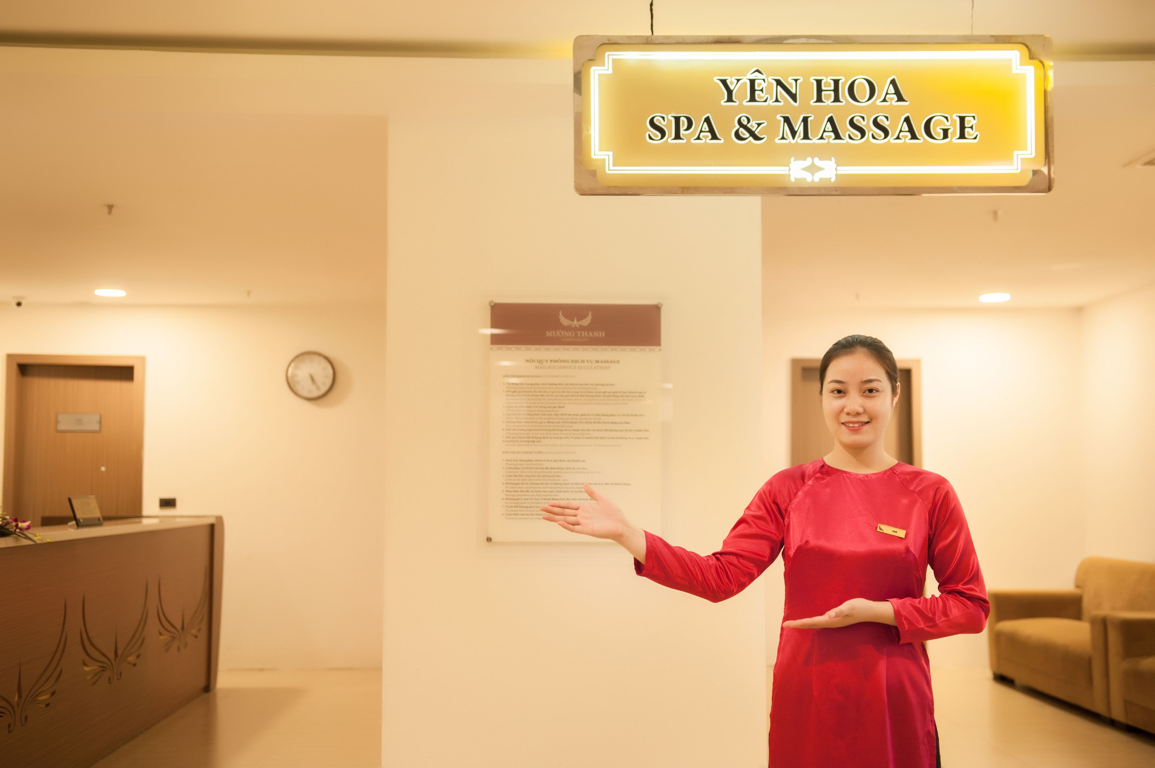 A reception area with a sign indicating a spa and massage service.