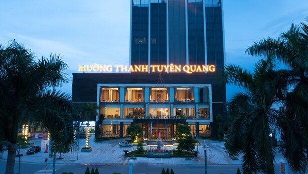 A modern building with a prominent sign reading "MUONG THANH TUYEN QUANG". - Muong Thanh Grand Tuyen Quang Hotel (Minh Xuan)