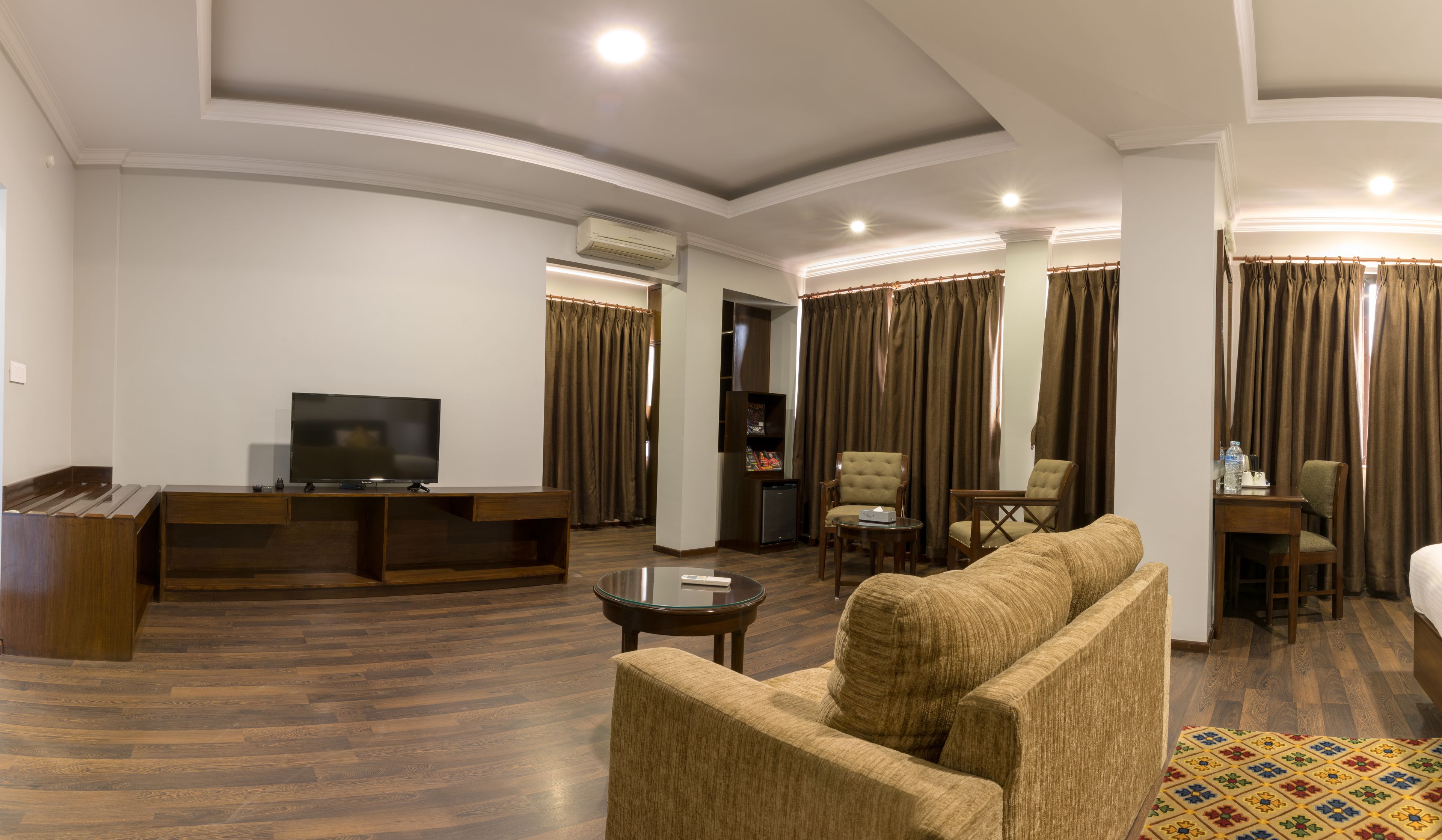 Executive Triple Room, 1 Bedroom | Living area | Flat-screen TV