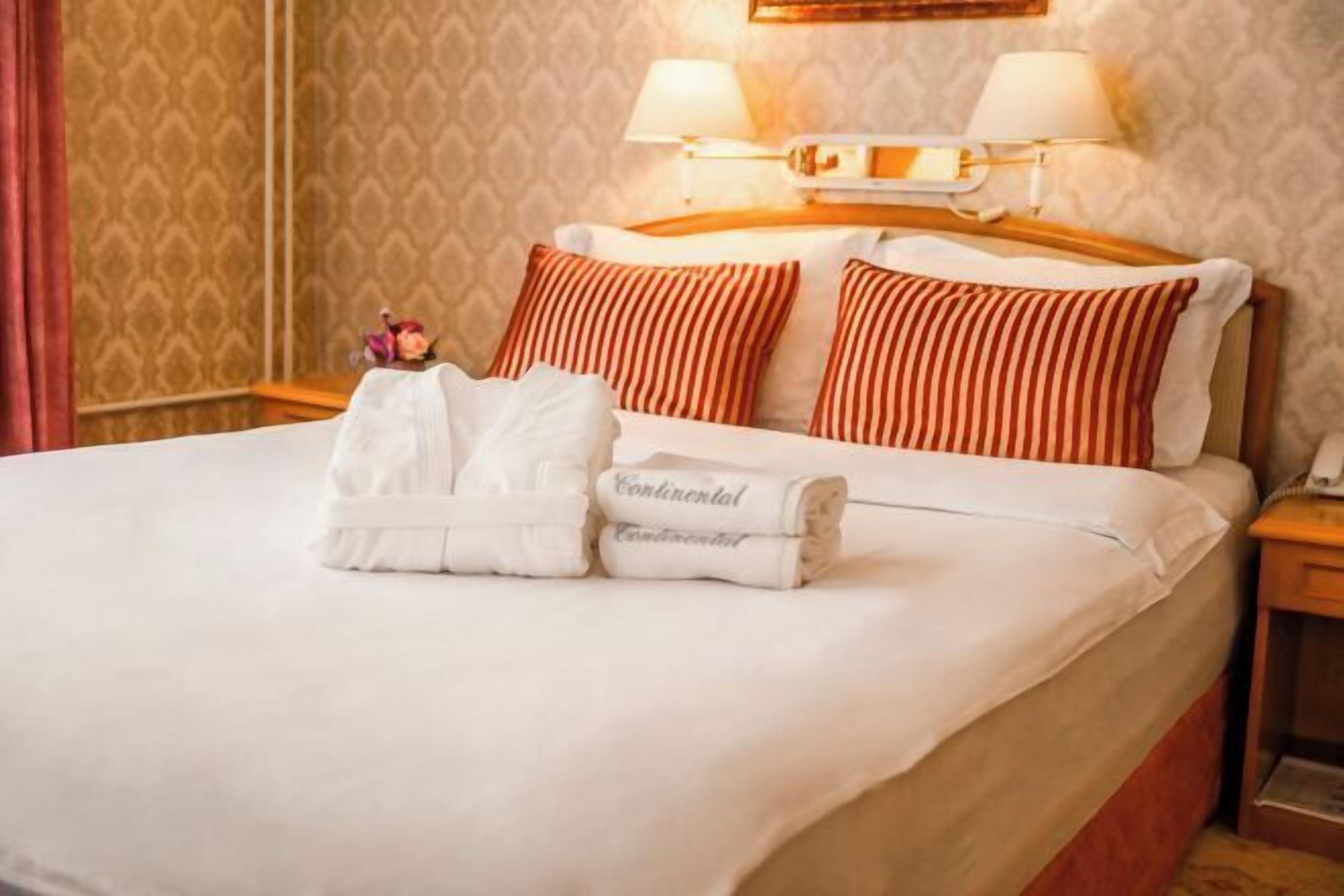 Premium bedding, memory foam beds, minibar, in-room safe