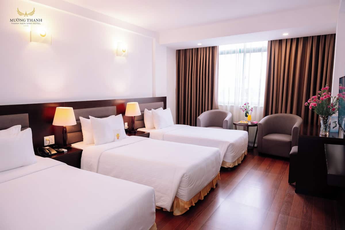 Deluxe Triple Room | Bar mini, meja, kalis bunyi, Wi-fi percuma 