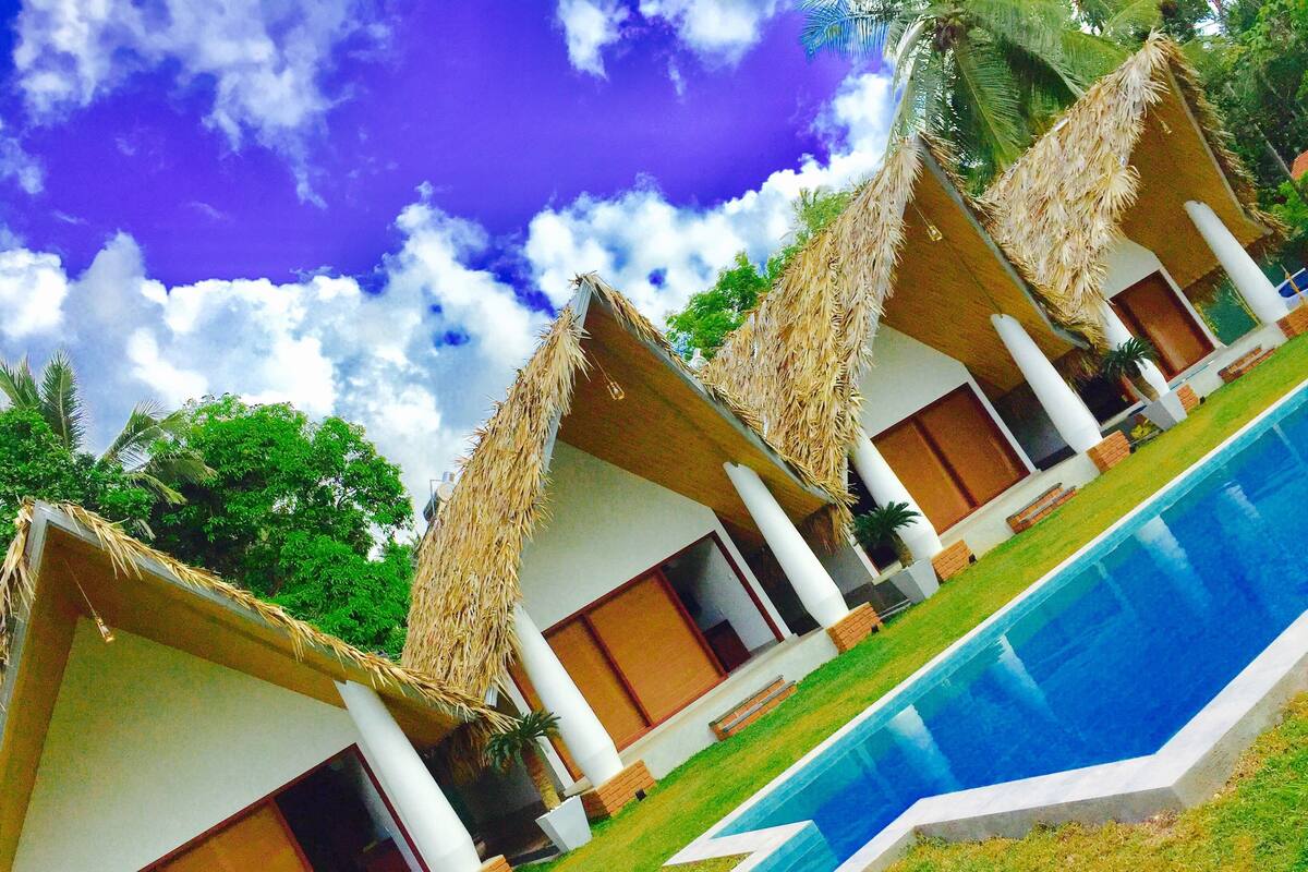 Deluxe Cabana with Pool View - Free Airport Pickup & Drop | Outdoor pool | Outdoor pool, pool umbrellas, pool loungers