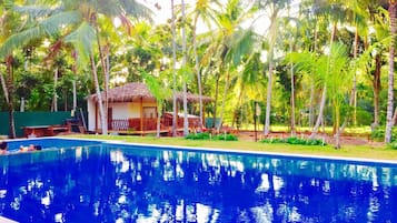 Outdoor pool, pool umbrellas, sun loungers