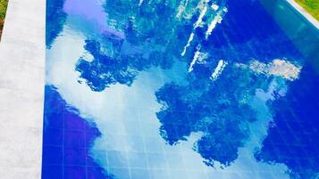 Outdoor pool, pool umbrellas, sun loungers