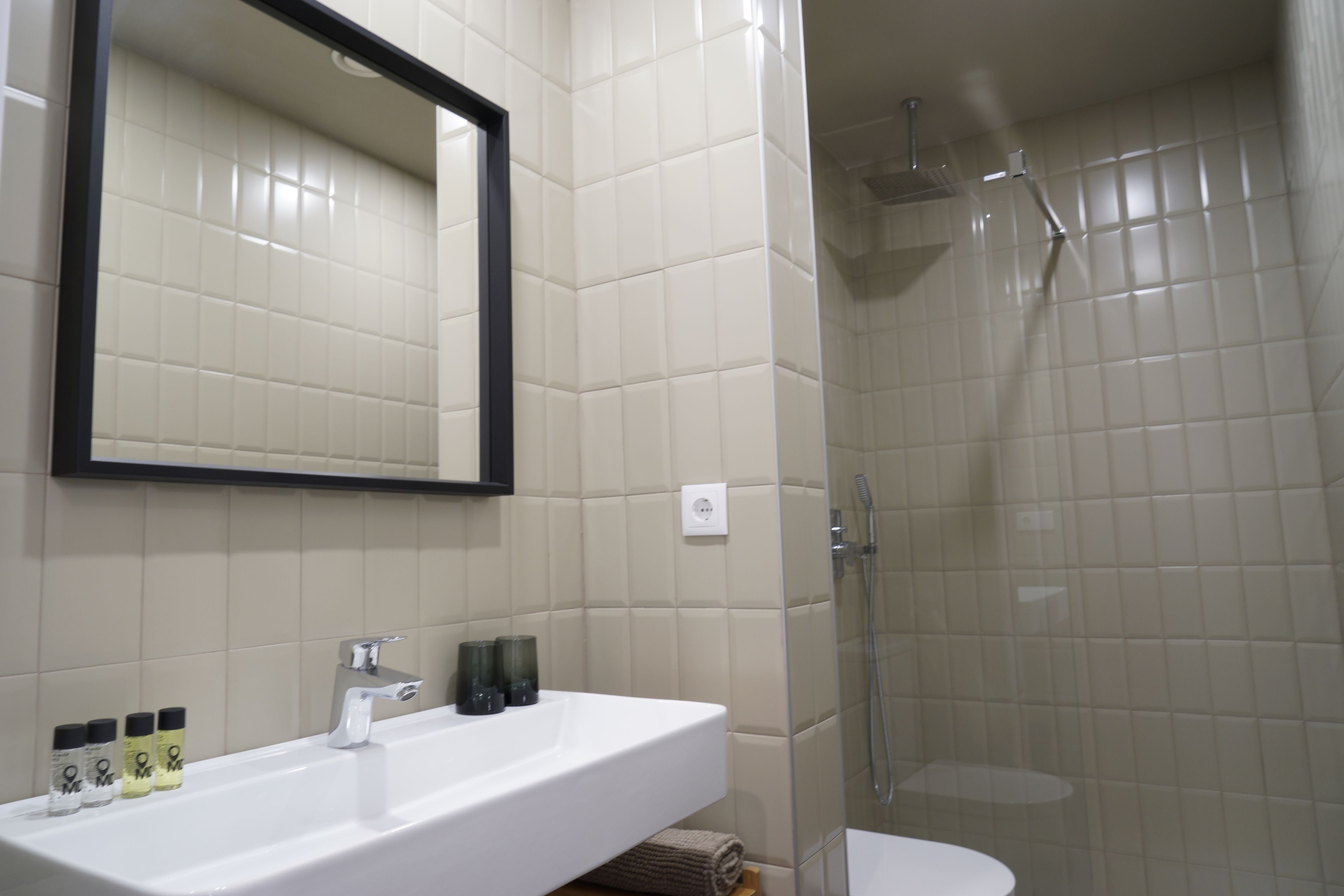 comfort double room, 1 queen bed | bathroom | shower, rainfall showerhead, designer toiletries, hair dryer