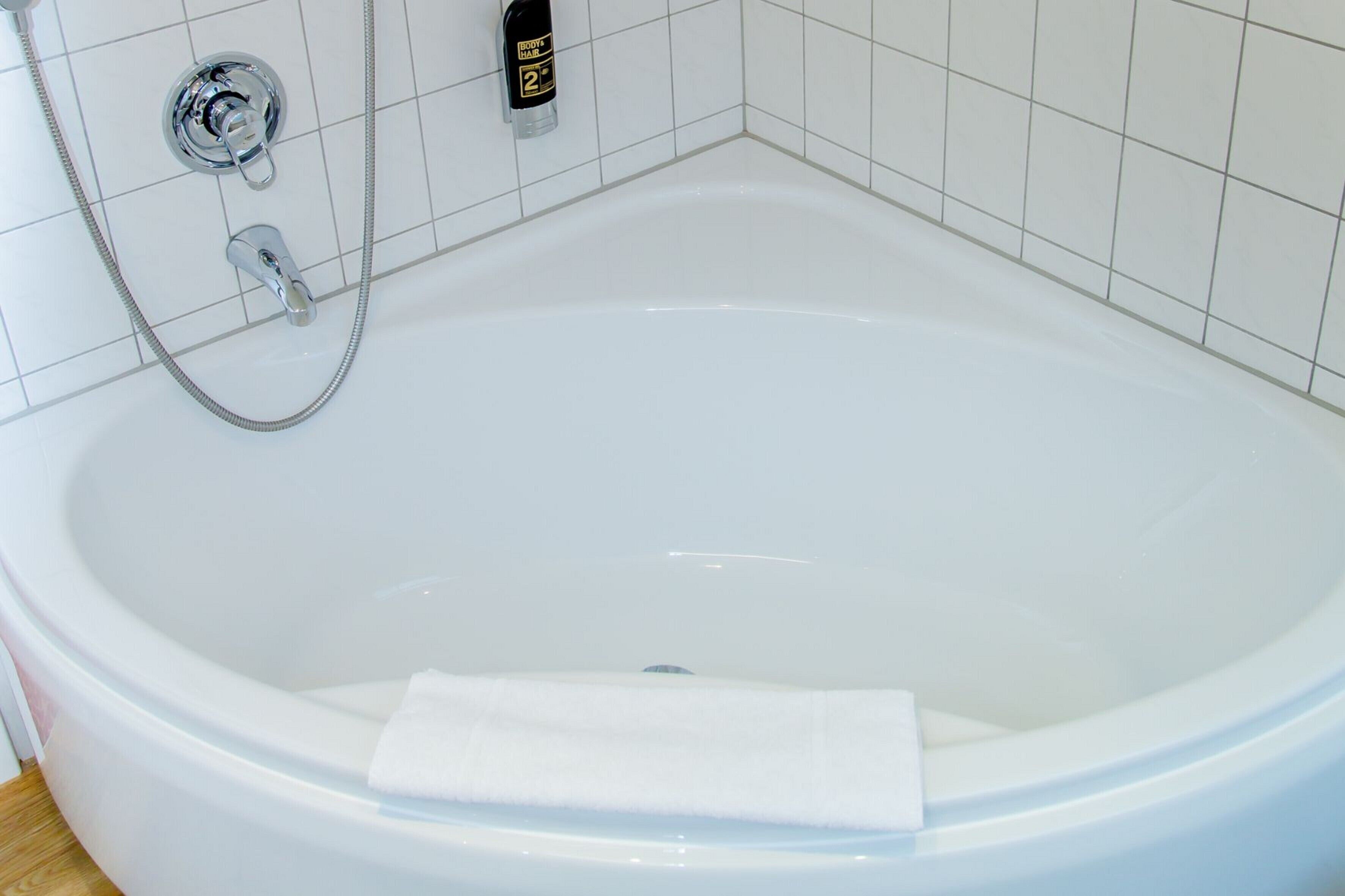 junior suite, balcony, park view | bathroom | free toiletries, hair dryer, towels, soap