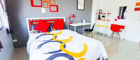 Premium bedding, desk, laptop workspace, blackout curtains