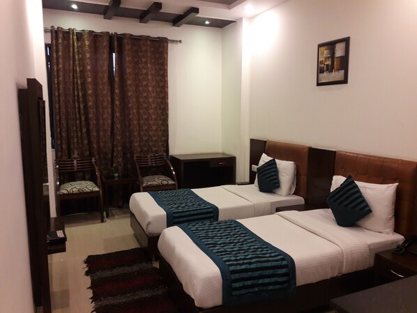 디럭스 더블룸, 침실 1개, 흡연, 시내 전망 | 이집트산 면 시트, 고급 침구, 오리/거위털 이불, 미니바