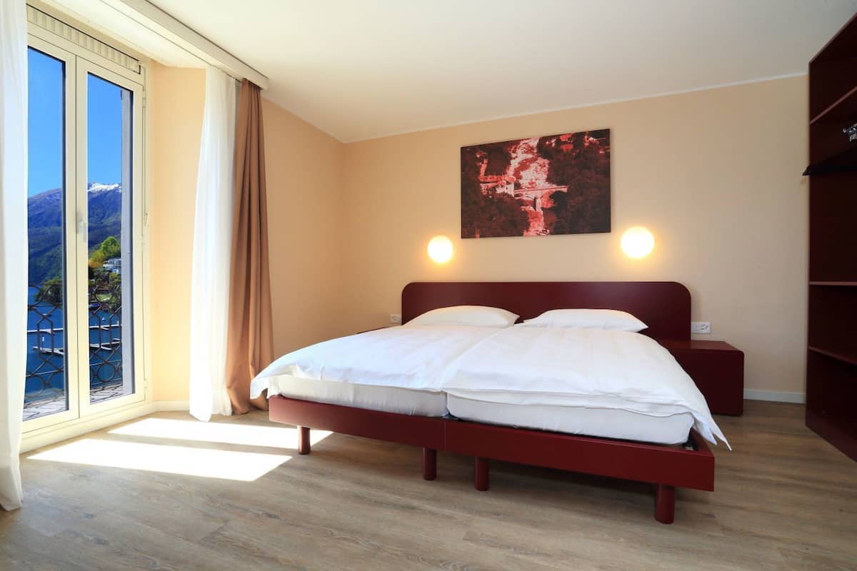 Twin Room, 1 Bedroom, Balcony, Lake View | In-room safe, desk, free WiFi, bed sheets