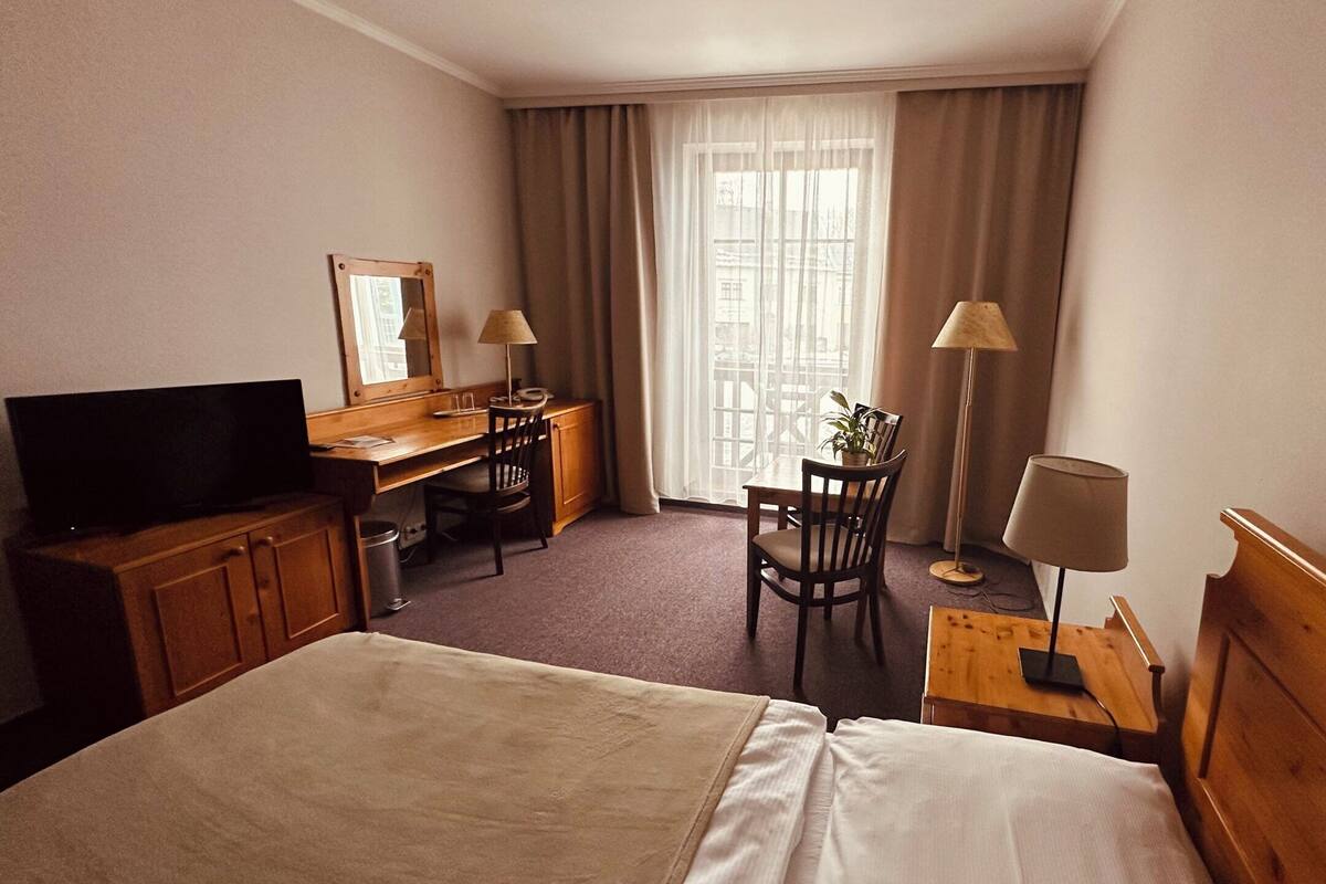 Desk, iron/ironing board (on request), WiFi (free), bed sheets