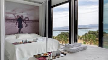 Suite Deluxe | Minibar, coffres-forts dans les chambres, bureau, chambres insonorisées