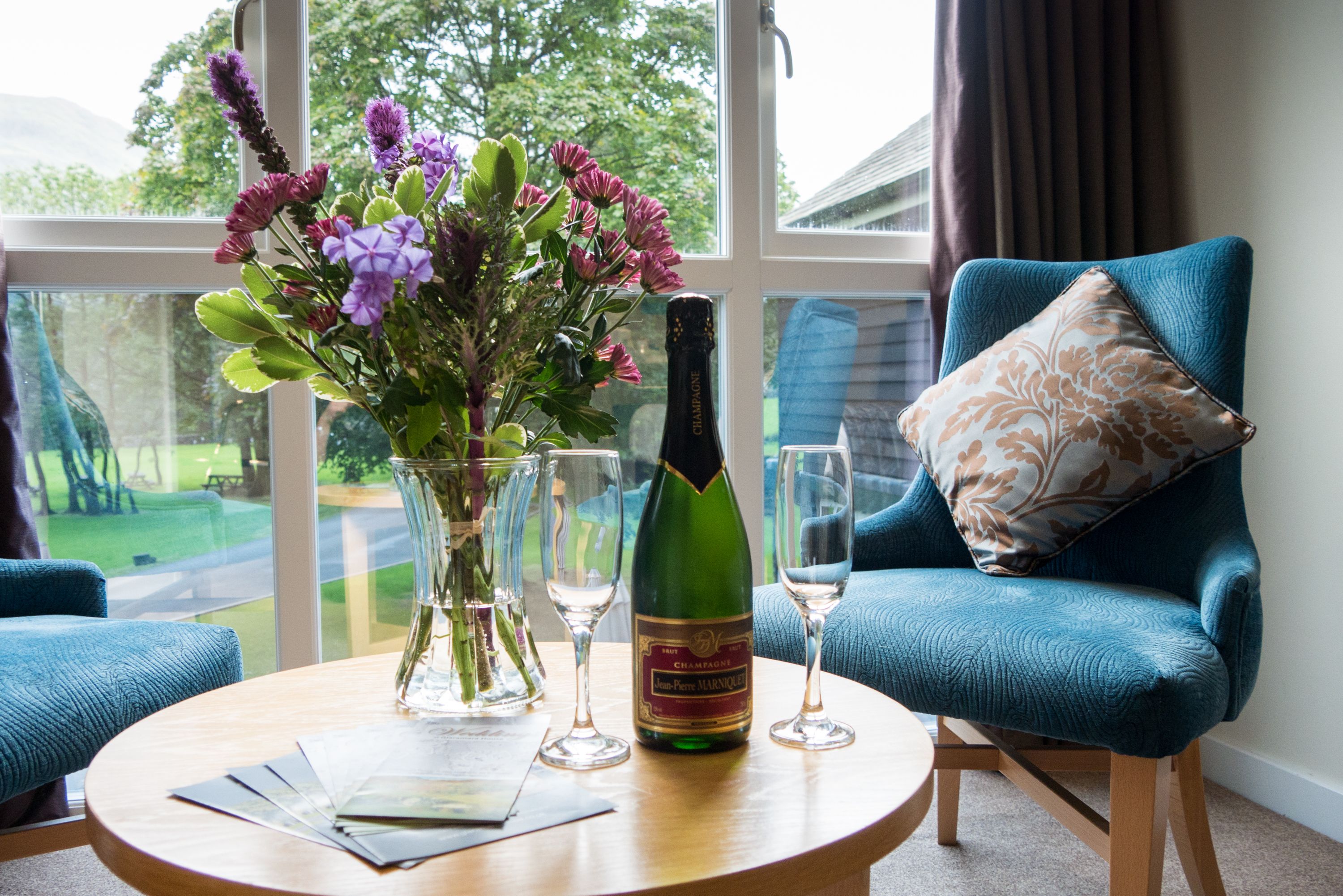 hypo-allergenic bedding, desk, laptop workspace, blackout curtains