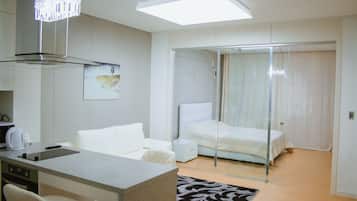 Apartment, 1 Double Bed (Studio) | Living area | Flat-screen TV, pay movies