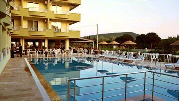 Outdoor pool, pool umbrellas, pool loungers