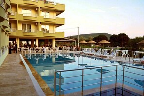 Outdoor pool, pool umbrellas, pool loungers